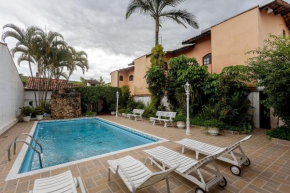 Casa Villagio Santa Mônica - Casa com piscina na Praia de Martim de Sá, Caraguatatuba